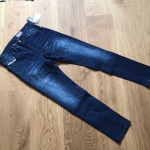 Blue wash diesel denim jeans with rips. Size 12